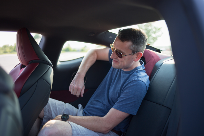 Here is normal-sized adult human Jalopnik EIC Patrick George, whom we crammed in the back seat for science.